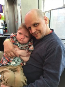 Child and dad spend time at the SCI Family Event.