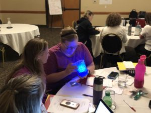 Participants explore lighted materials
