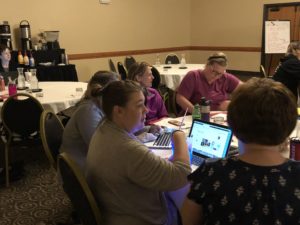 Student teams engage in discussion
